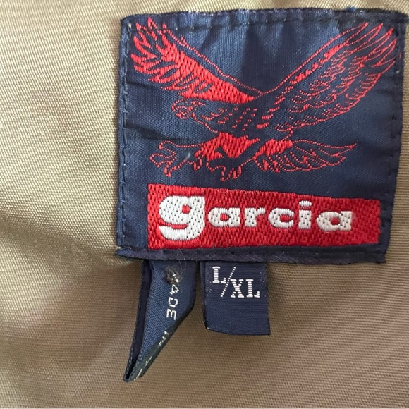 Garcia Olive Green Fishing Vest size L/XL
11 front pockets (2 long zip pockets) - Picture 5 of 11